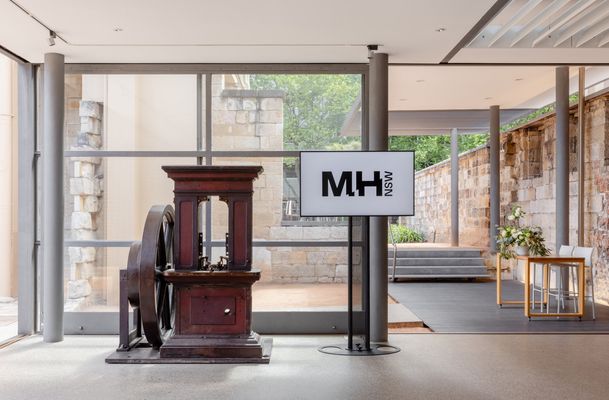 The Mint Bar set up with 55" LED screen and Coining press (1854) loaned from Dixson Library, State Library of New South Wales. Bequeathed by Sir William Dixson.