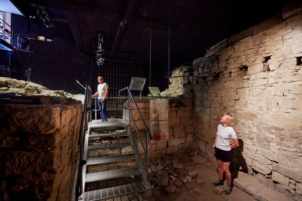 Wide shot of two visitors exploring Parbury Ruins during Sydney Open