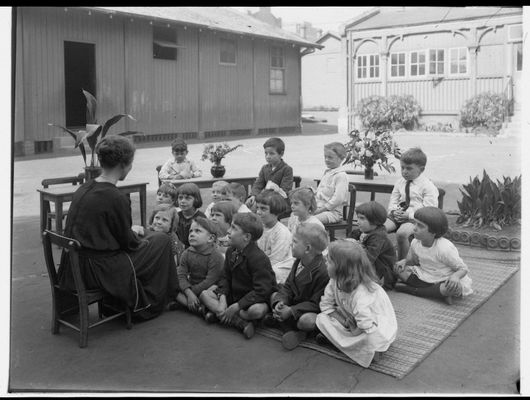 Blackfriars Infants School: teacher telling story to children, 1923